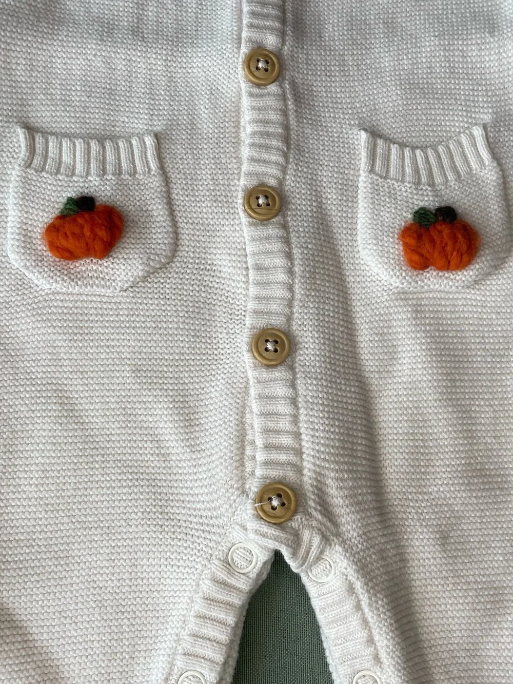 Upcycled Cream Knit One-Piece with hand stitched Pumpkin Pocket Accents